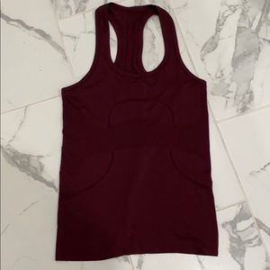 Gently worn burgundy Lululemon swiftly tank top